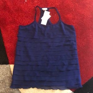 Razor back ruffle shirt